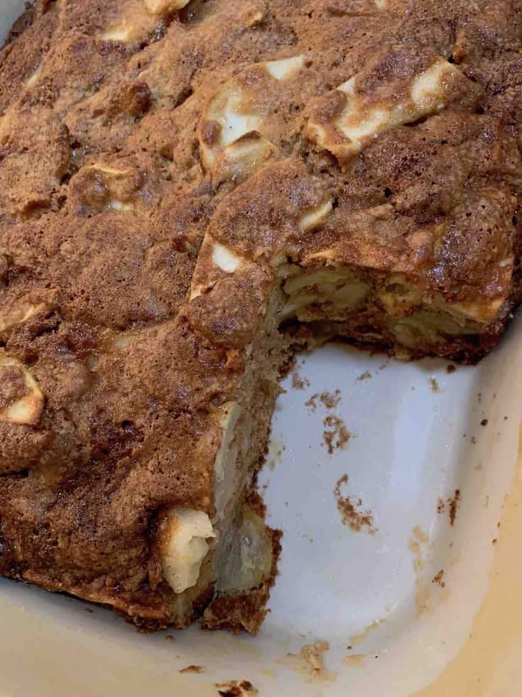 Missing square of baked apple hill cake from a pan 