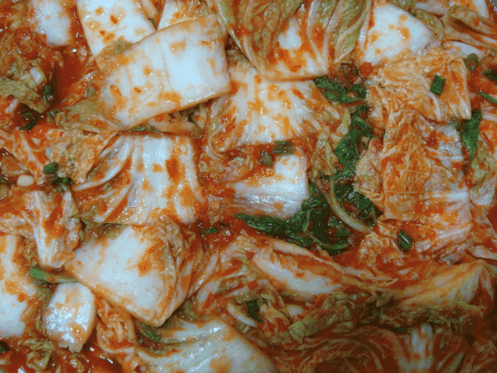 fermented cabbage leaves with red pepper flakes