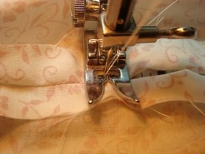 sewing the old sheets in sewing machine