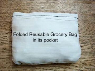 neatly tucked grocery bag in pouch