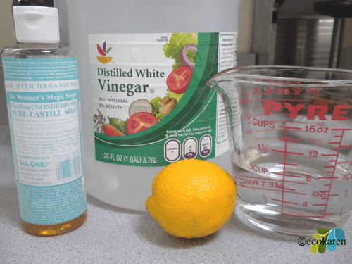 Castile soap, white vinegar, lemon, 1 cup water in pyrex 