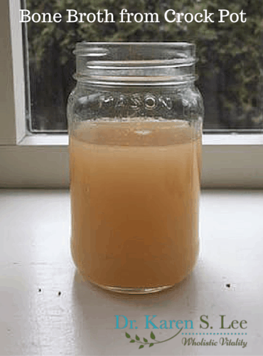 Bone broth from Crock pot in mason jar. Color is a deeper amber