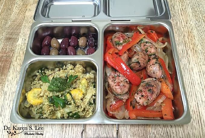 Sausage and peppers, quinoa, grapes in bento style lunch box