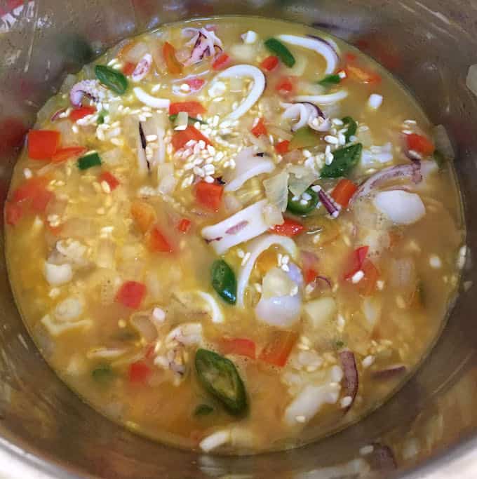 Seafood Paella in instant pot about to boil