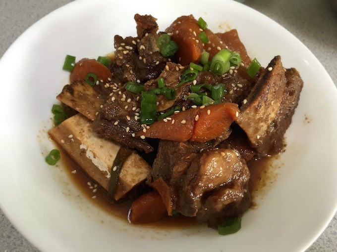 Kalbijjim Korean Short Ribs on white bowl