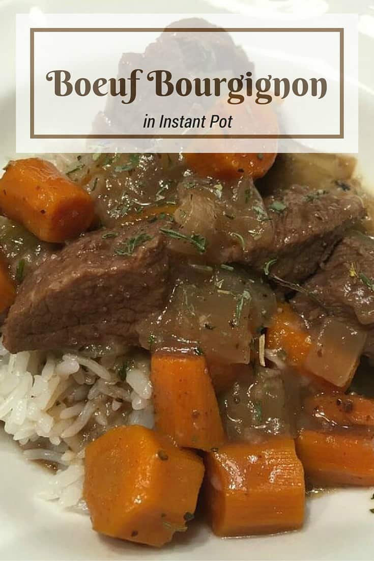 Boeuf Bourgignon with carrots over white rice in white bowl