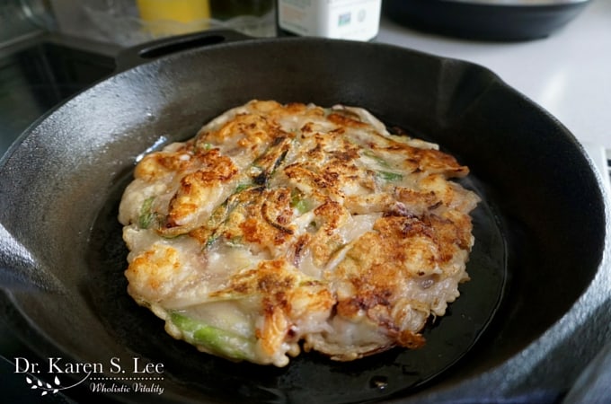 Browning Korean Seafood Pancake on cast iron skillet