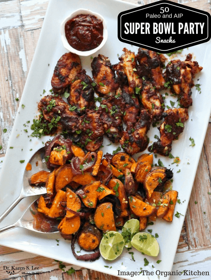 chicken wings and roasted yams on white plate