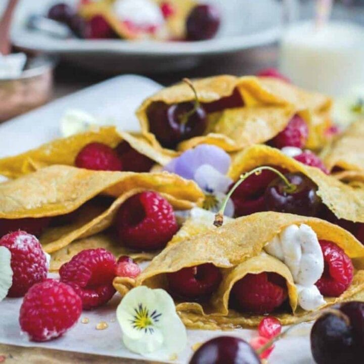 yellow egg pancakes with berries