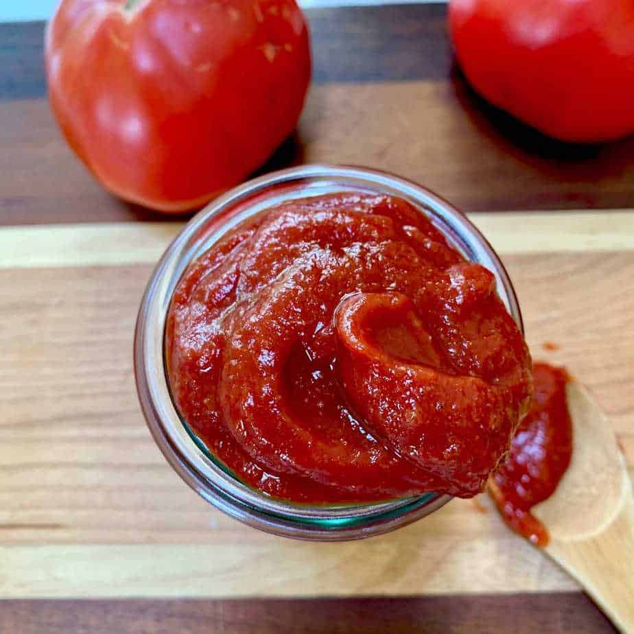 Top view of ketchup in glass jar